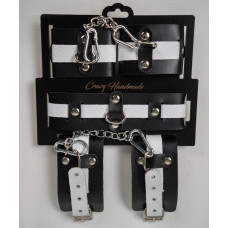 Набор фиксаторов из черной и белой натуральной кожи Набор фиксаторов из черной и белой натуральной кожи